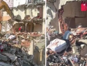 Alkışlar iş makinesi operatörüne! Türk bayrağını aldıktan sonra duvarı yıkmaya devam etti